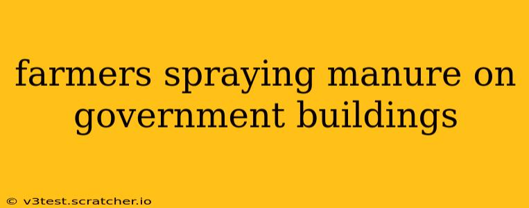 farmers spraying manure on government buildings