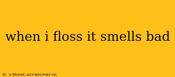 when i floss it smells bad